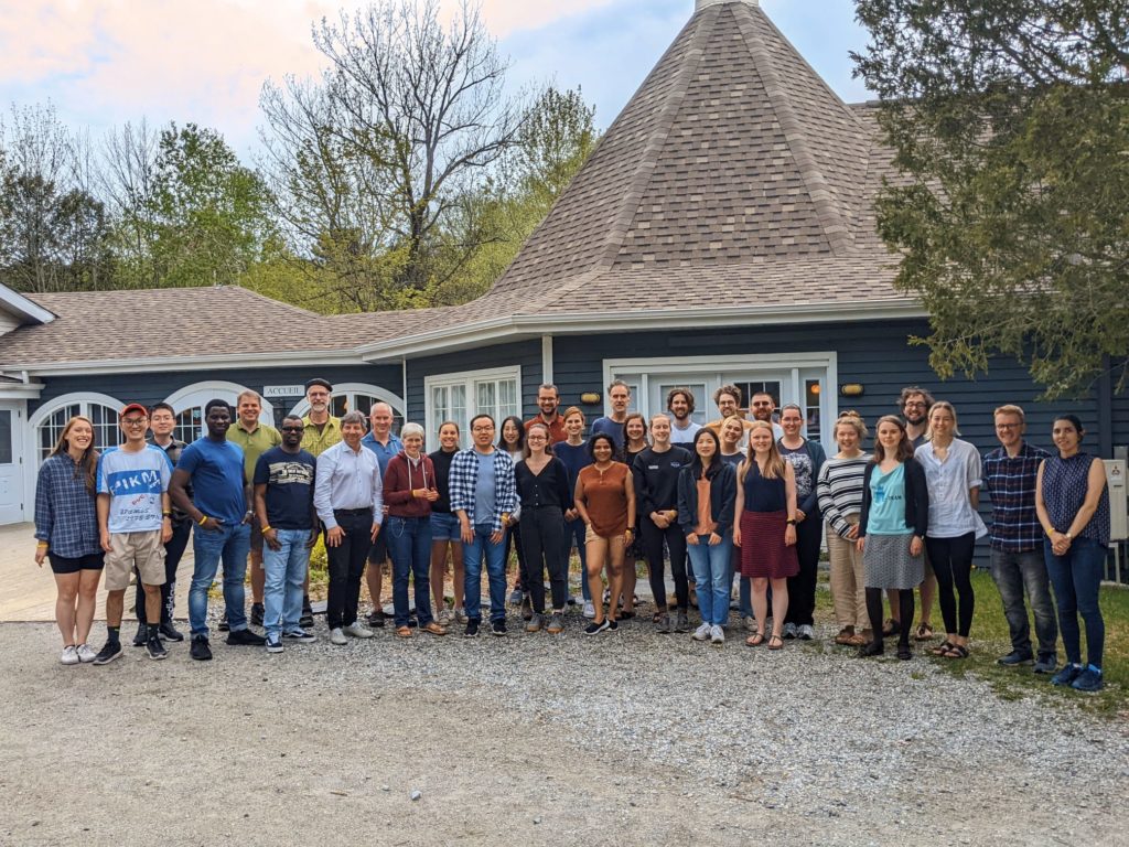 Group picture of 33 participants of the ArcTrain Annual Meeting, standing in front of the main building at Jouvence.